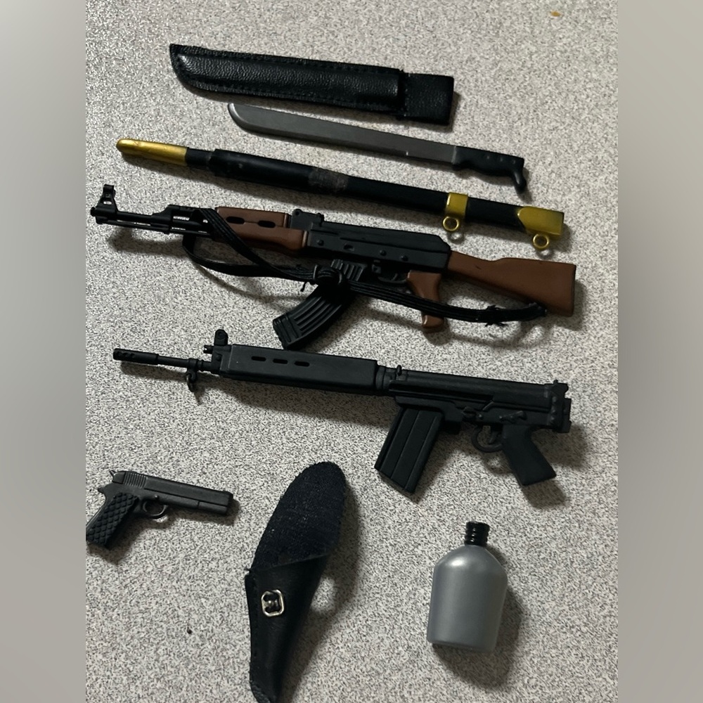 21st Century Toy Guns & Swords with Sheaths Bonus Mini Leather Jacket Lot of 8+